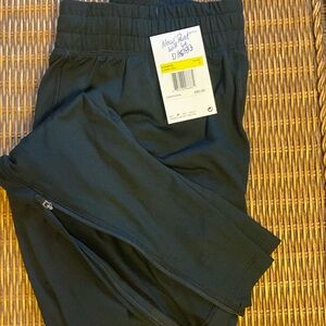 Nike Joggers with zip bottom W S